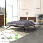 Astrid platform bed in solid walnut and dark chocolate maple wood w/ two height-adjustable headboards