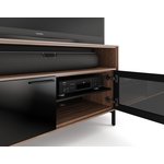 A close-up of BDI's Cavo TV stand's open door